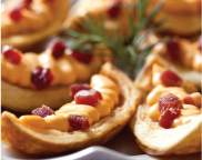 Imagem de cascas de batata com queijo cheddar e bacon
